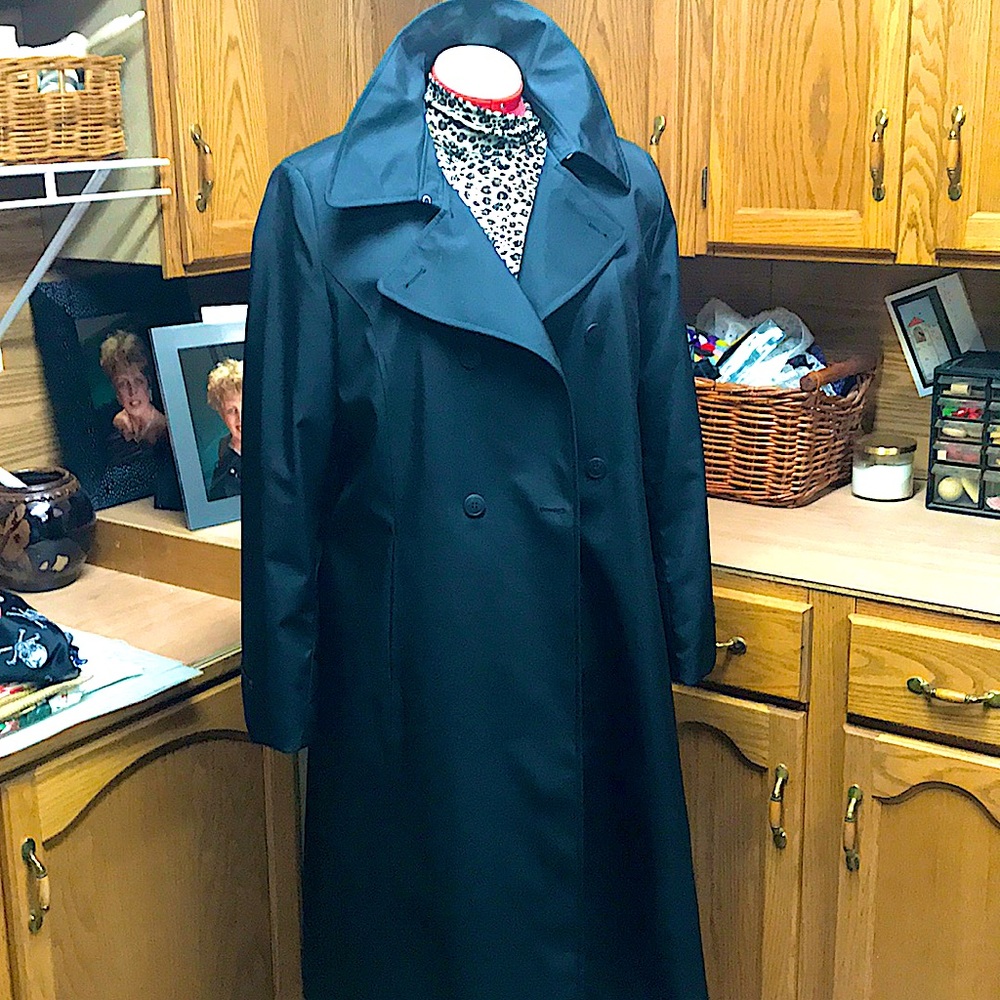 Double breasted full length trench coat